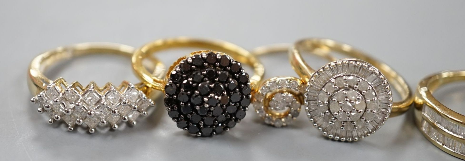 Four assorted modern 9ct gold and white or coloured diamond cluster set dress rings and two similar rings set in gilt 925